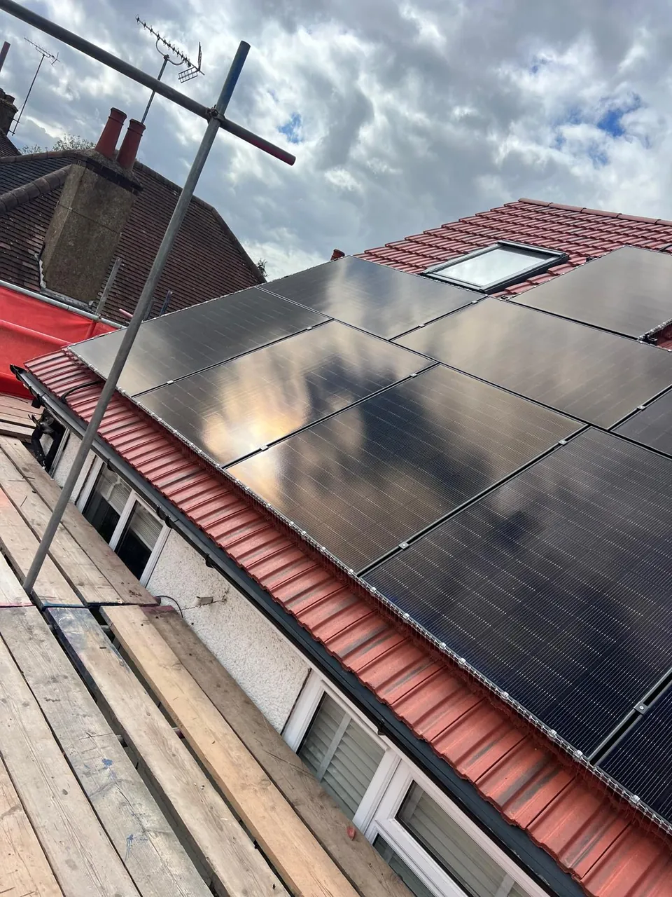 The pitched roof array seen from the scaffold.