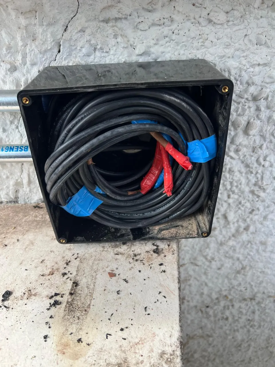 Inside the junction box: every cable end marked.