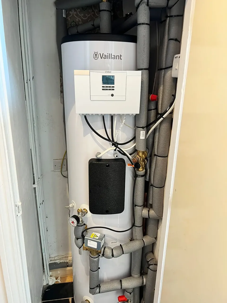 Inside: the cylinder with the controller and the valves in one cupboard.