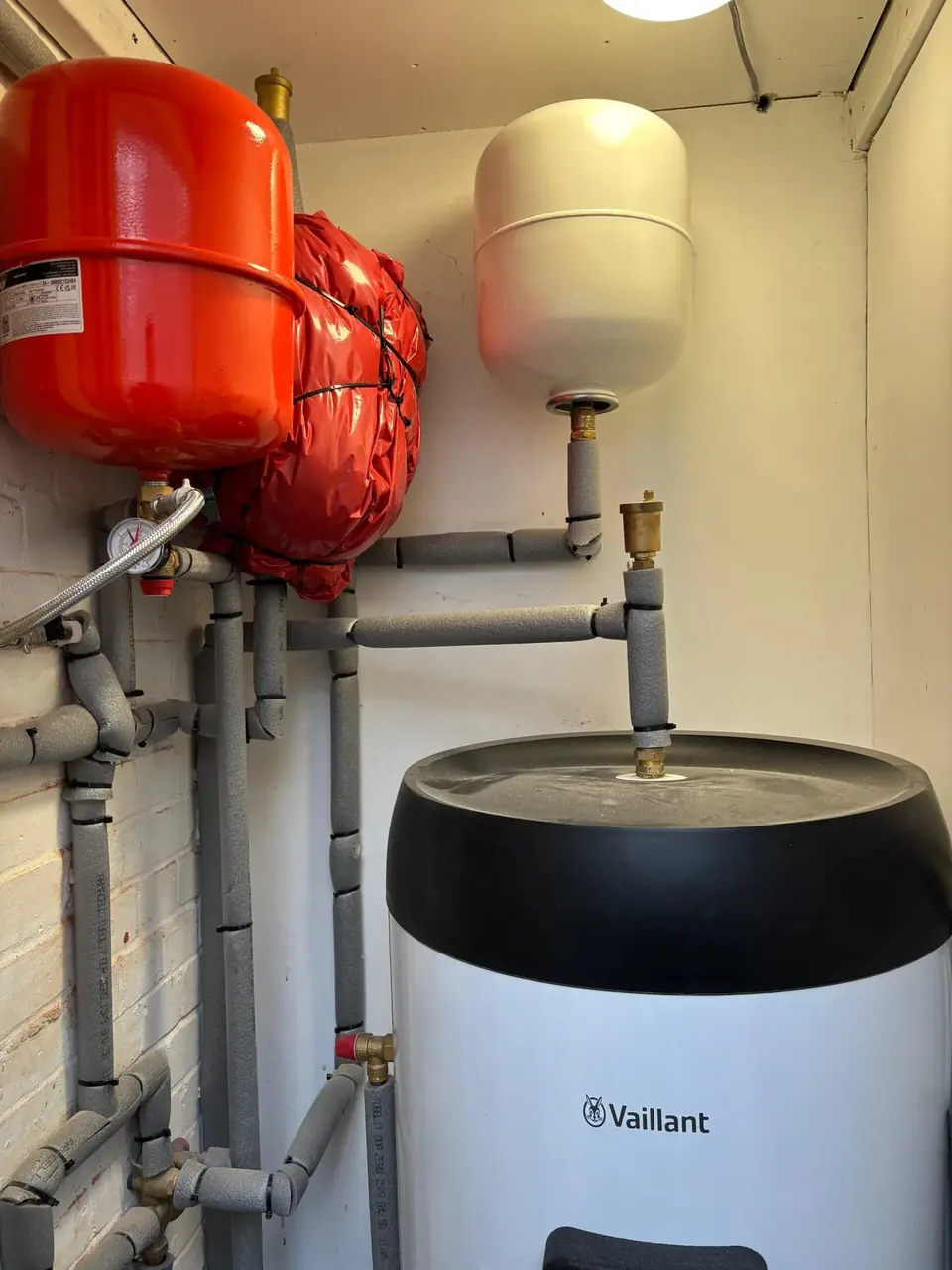 The cylinder and expansion vessels indoors.