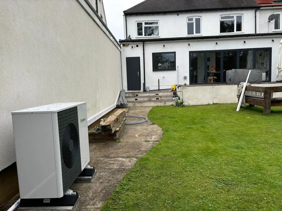 The unit beside the house, with the garden clear behind it.