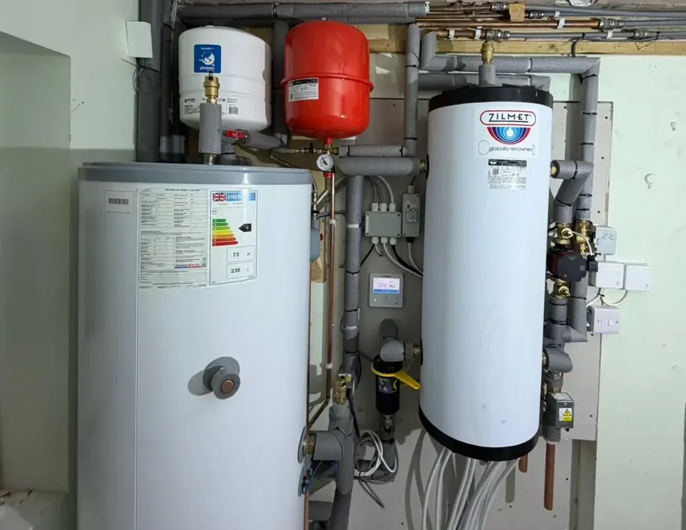 The 250-litre cylinder and the controls in the plant room.