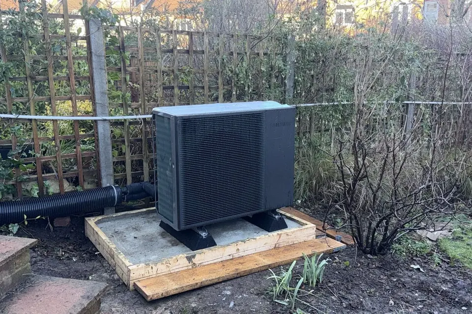 The Samsung unit on a levelled base built up out of the border.