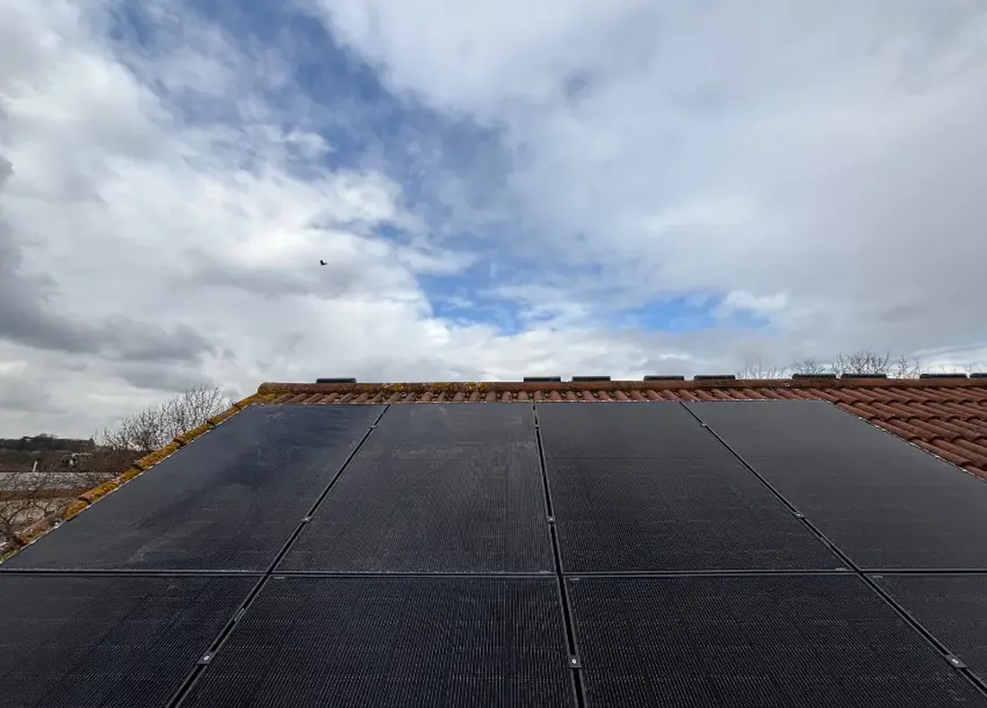 Solar panels installed across a London roof